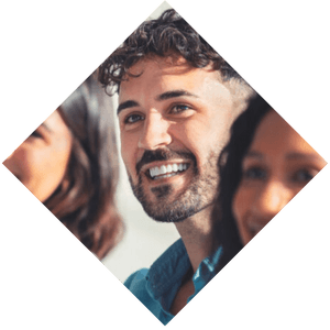 Close up portrait of smiling man with beard attending a CentralSquare seminar