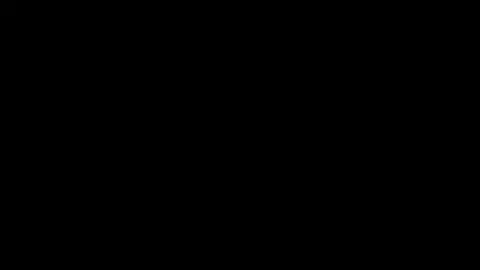 Animated screengrab of a woman looking at a screen, wearing a headset